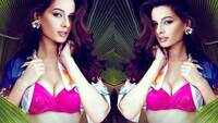 'Bikini Girl' Evelyn Sharma sizzles in pink as she embarks on a vacation 