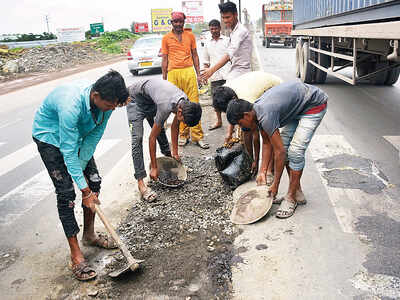 Work to fill craters starts, barricades go