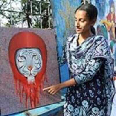 Painting is her route to save the tiger