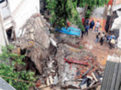 Lucky escape for Mahim family after 3-storey bldg crashes on to their house