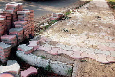 Should paver blocks be replaced with concrete on footpaths?