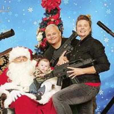 Pose with your favourite firearm, and Santa