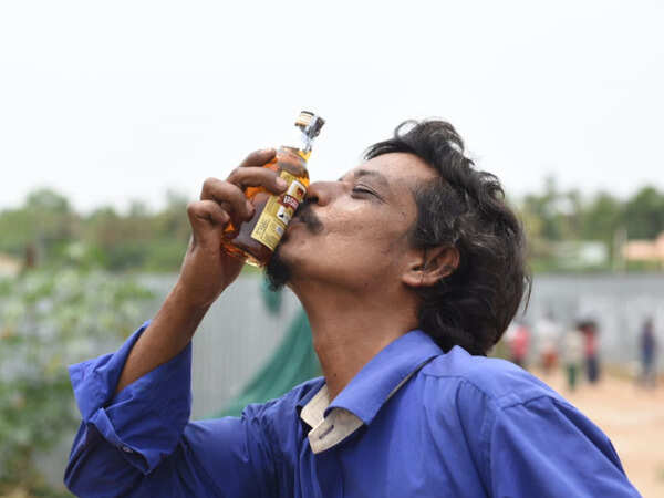 Tasmac liquor shops reopen in Tamil Nadu, tipplers stand in queues from early morning