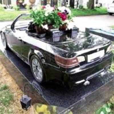 Car fan's grave has BMW tombstone with parking ticket