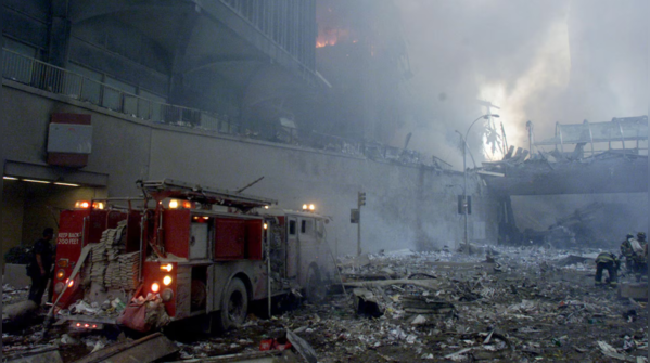 Firefighters search through debris