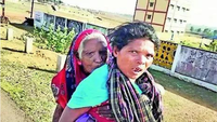 For KYC, tribal woman walks 4km to bank with mom-in-law, 90, on her back
