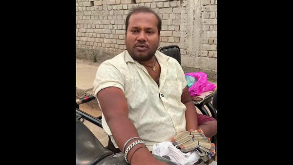 Wheelchair-bound man finds bag of cash, awaits owner
