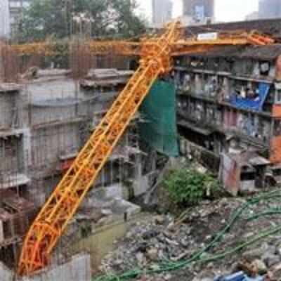 Three hurt as crane falls 30 floors