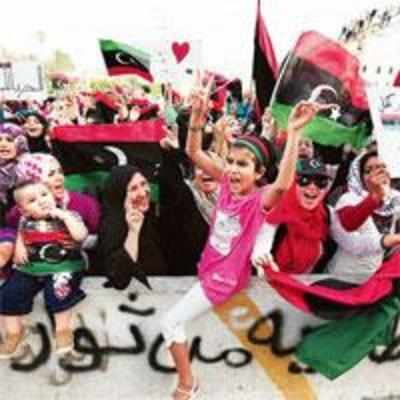 Tripoli celebrates as rebels to shift power to capital