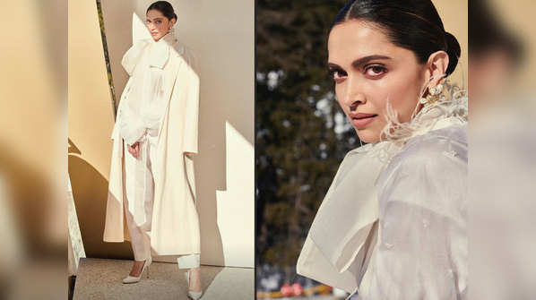 ​Deepika Padukone adds a touch of glamour in a dramatic white pantsuit for a mental health luncheon