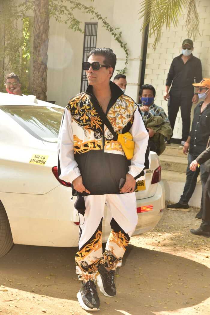 Groom's filmmaker-friend Karan Johar makes heads turn as he arrives at the wedding venue all decked up