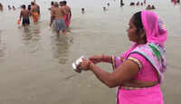 Devotees take holy dip at Sangam Ghat on Guru Purnima 