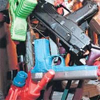 Manipur villagers protest, consign toy guns to flames