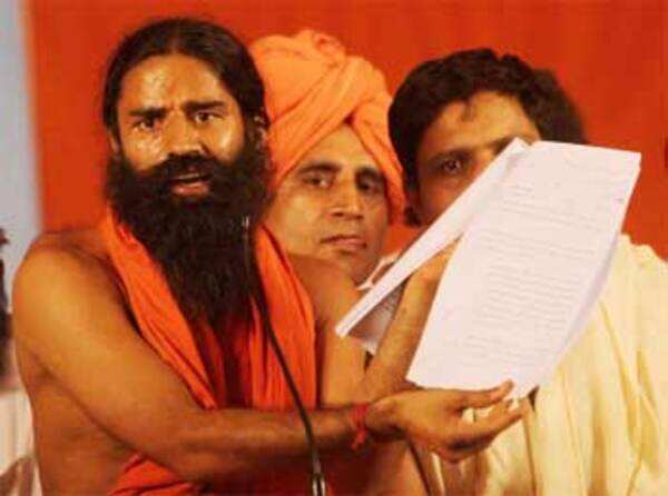 A thug or maharaj: MP Cong divided over Baba Ramdev