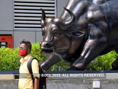 Sensex sinks 470 points on profit booking, metals dip