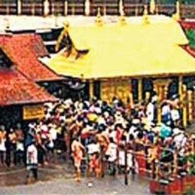 Woman sneaks into Sabarimala temple, held