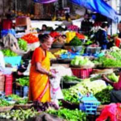 Veggie prices rise and  fall with moody rains