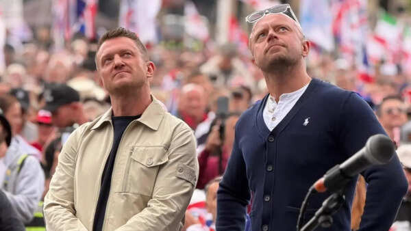 Dozens arrested at Tommy Robinson march in London; Elon Musk calls Britain ‘prison island’