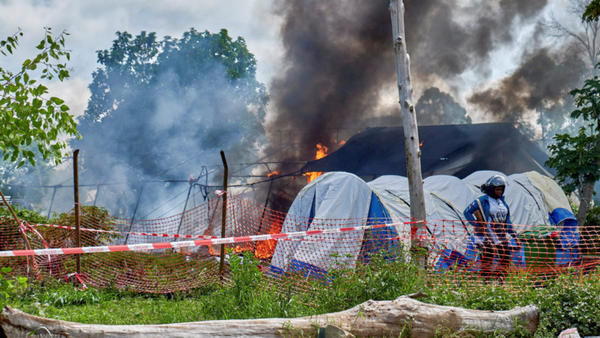 An Ebola center is burned in Congo as fear and anger grows over the outbreak