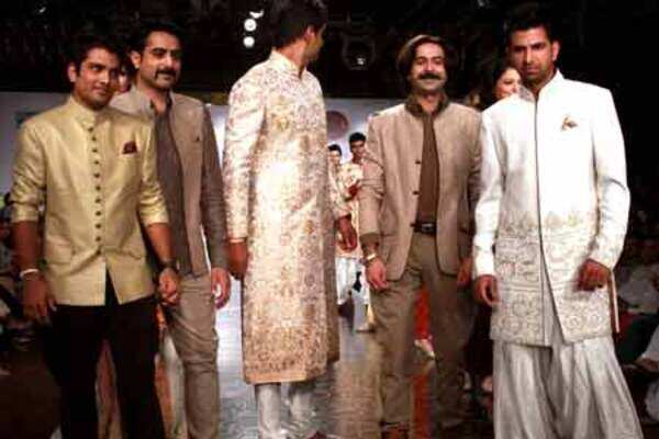 Cricketers walk the ramp at RFW