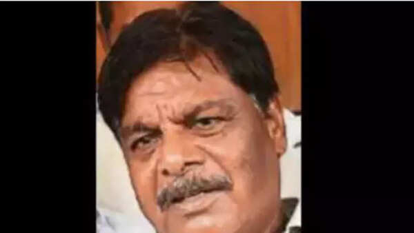 Video of Karnataka minister Mahadevappa being 'helped' by gunman to wear shoes goes viral