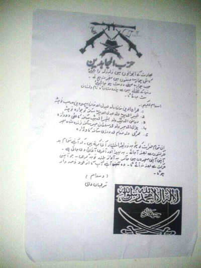 Hizb posters threat people in Srinagar