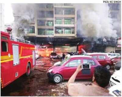 Two burnt to death in fire at Kharghar car showroom