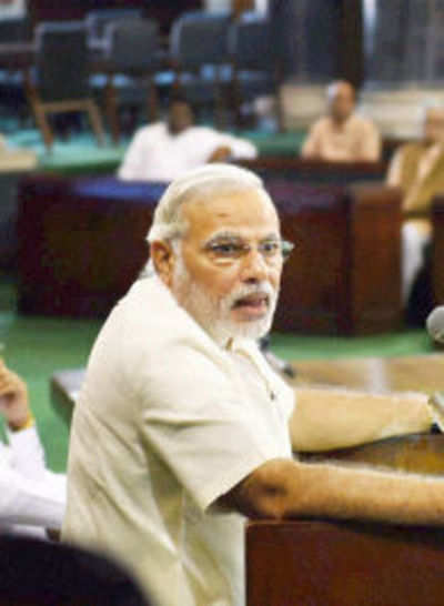 Don't touch my feet, Modi tells MPs