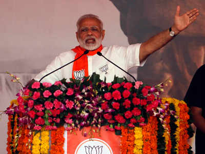 Narendra Modi dares Congress to contest Gujarat polls on development plank