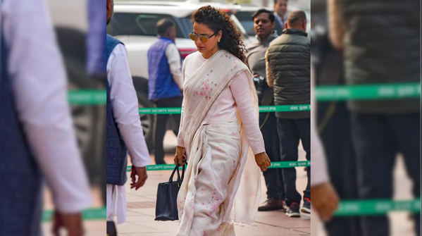 The white cardigan and saree combo