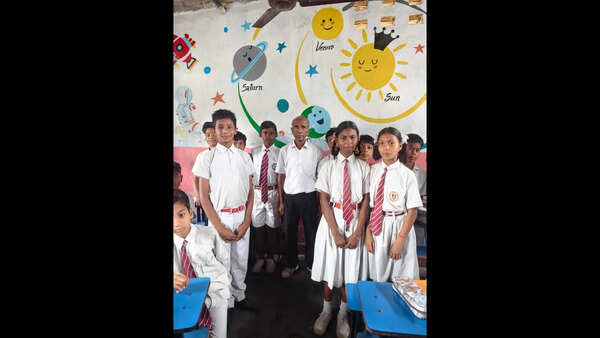 Homeopathic doctor K P Dey provides accessible education for over 15,000 slum children; community supports a flexible tuition system