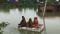 Bihar floods: Locals use makeshift boats for movement in Muzaffarpur 