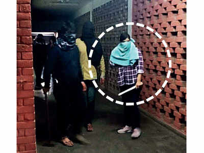 DU student, one of the masked JNU attackers, approaches NCW