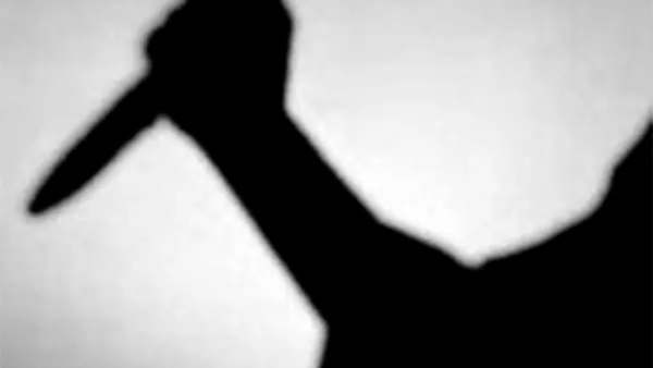 Student stabbed over poster dispute