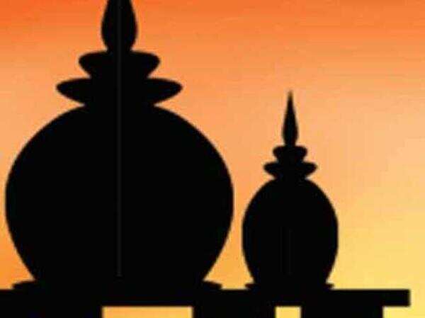 Temple takes up road space, officials dither