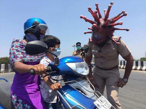 Covid-19 in Chennai: Don’t venture out in Villivakkam area, cop wearing disgusting corona helmet may come with you!