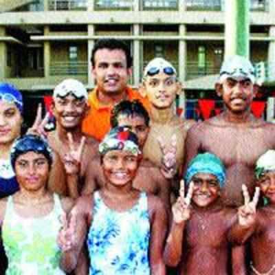 Father Agnel swimmers win top accolades at dist meet