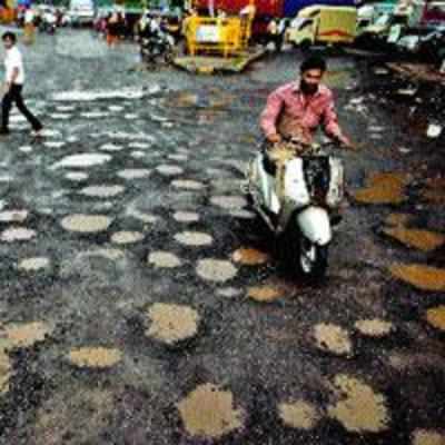 Potholes on APMC roads upset commuters, traders