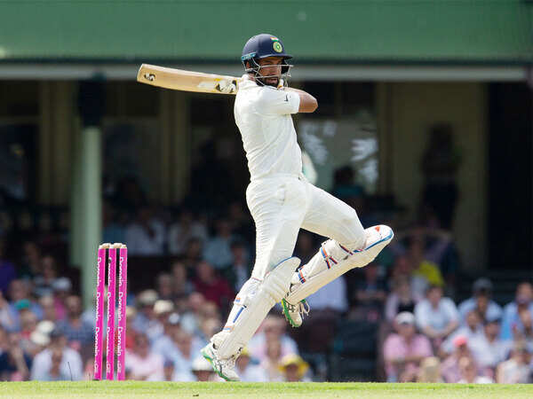 Australia rein in Virat Kohli, but run into the great Indian Wall Cheteshwar Pujara