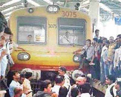 Harbour commuters spill onto tracks to protest repeated disruptions in service