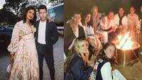 Priyanka Chopra and Nick Jonas cuddle up at a beach bonfire as they celebrate the launch of Nick's new business venture 