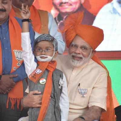 Gujarat Elections 2017: Narendra Modi delighted to meet little Modi lookalike at Navsari rally