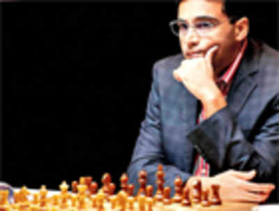 Anand loses final round, Karjakin clinches title