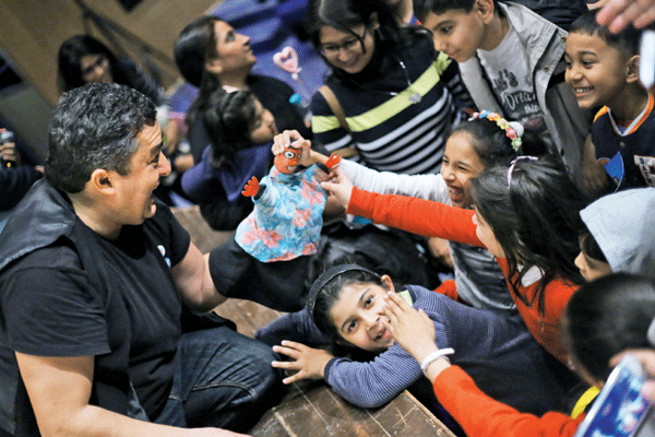 Jose Gil performs a pupet show at the 8th day of the Ishara International Festival in Gurgaon