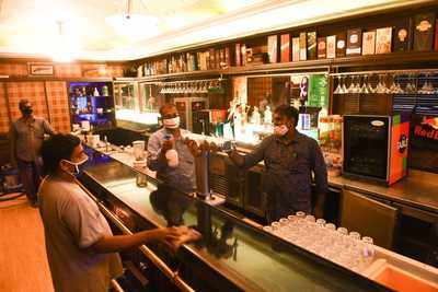 Police raid two bars; 196 arrested