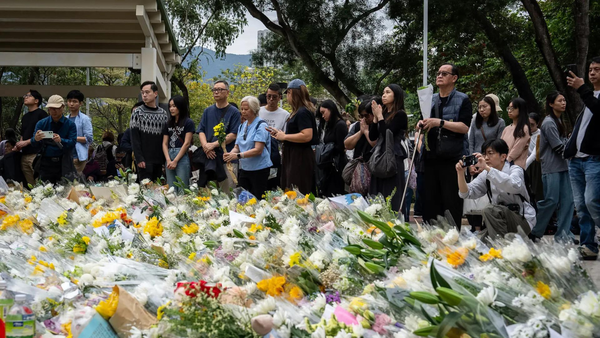 Hong Kong fire: Citizens' anger over 146 deaths spills on to streets, demand fair probe; China slaps sedition law