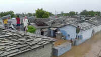 Telangana: Flash flood submerges Malkapur village, people take shelter on rooftop of houses 