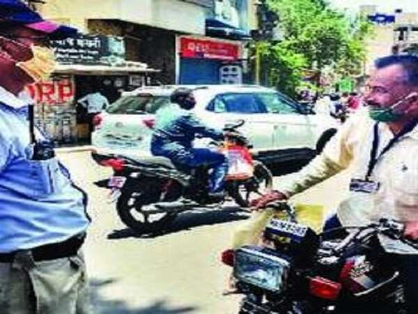 Click photos of those not wearing masks: Police