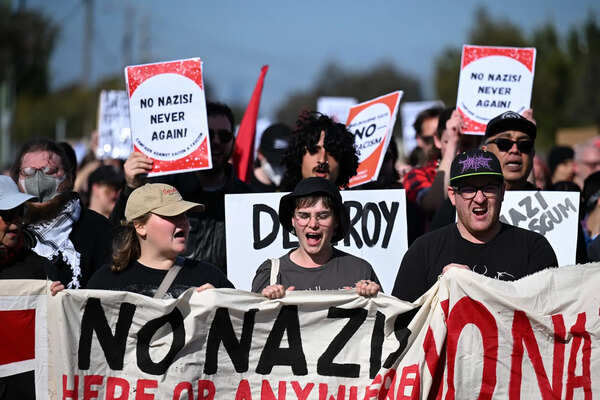Australia bans neo-Nazi network under new law that criminalises hate groups