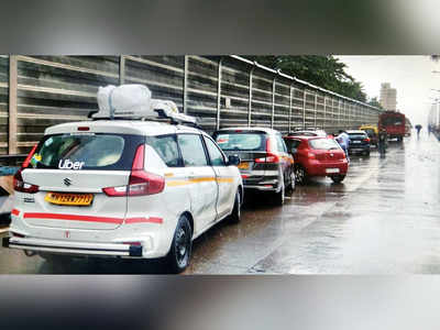 Traffic jams dot the city as cabs park along road medians